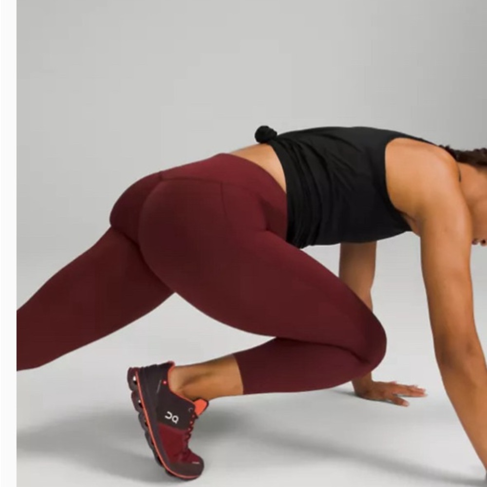Like New- Lululemon Fast and Free 25” tights Deep Wine color